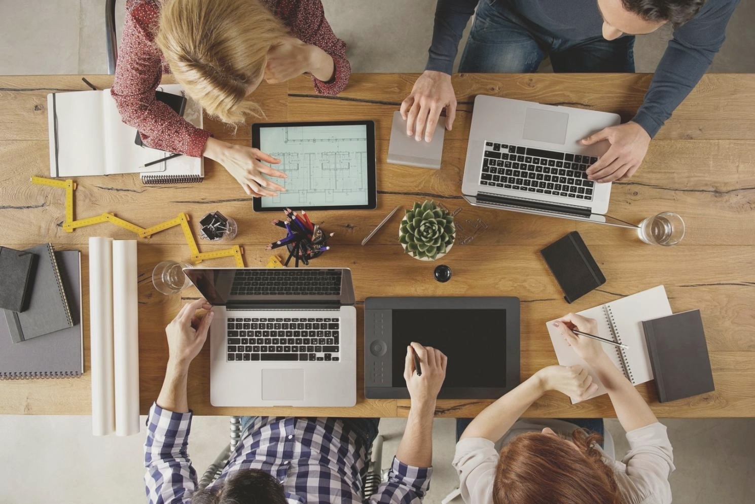 Professional budget review session with detailed documentation